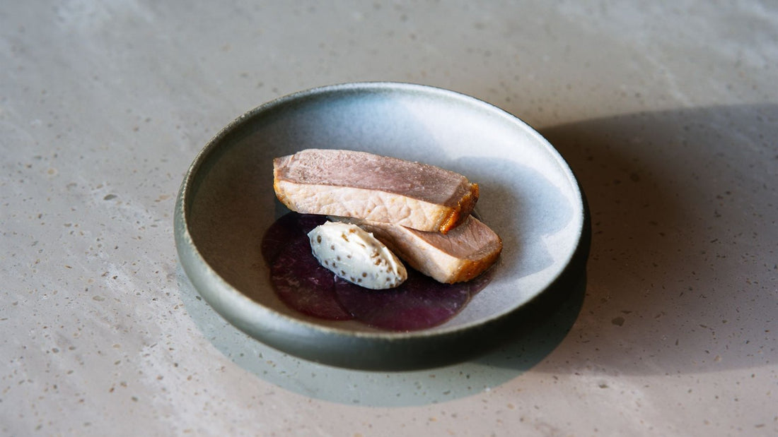 Magret de canard tranché et dressé à l'assiette