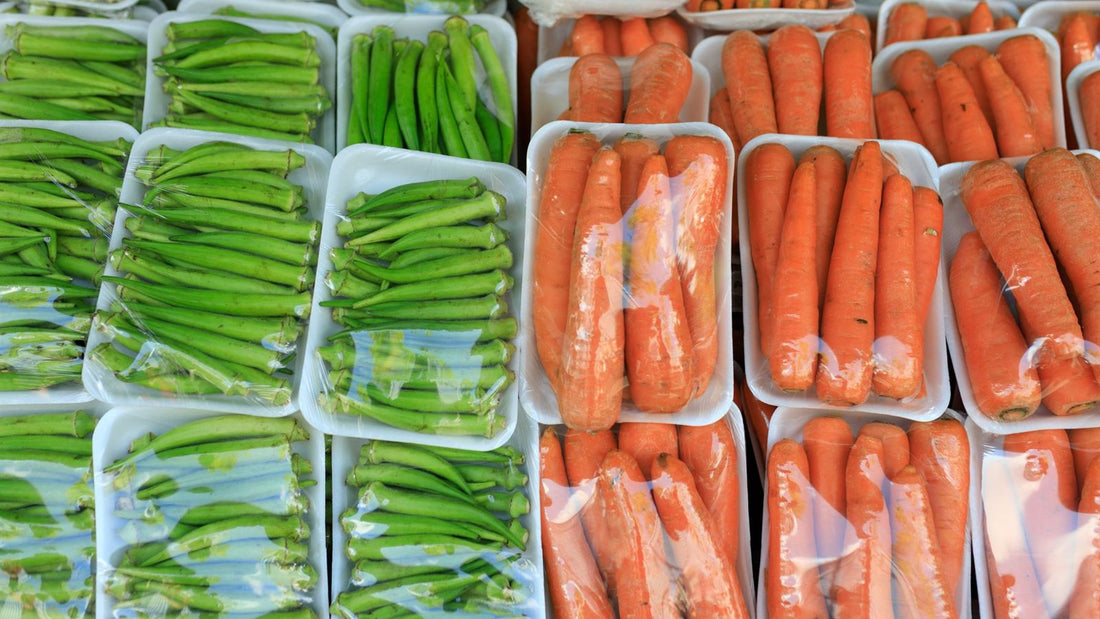 Haricots verts et carottes conditionnés en barquettes